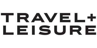 Travel + Leisure logo in black text on a white background